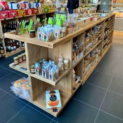 Présentoir central épicerie à roulettes, bois massif